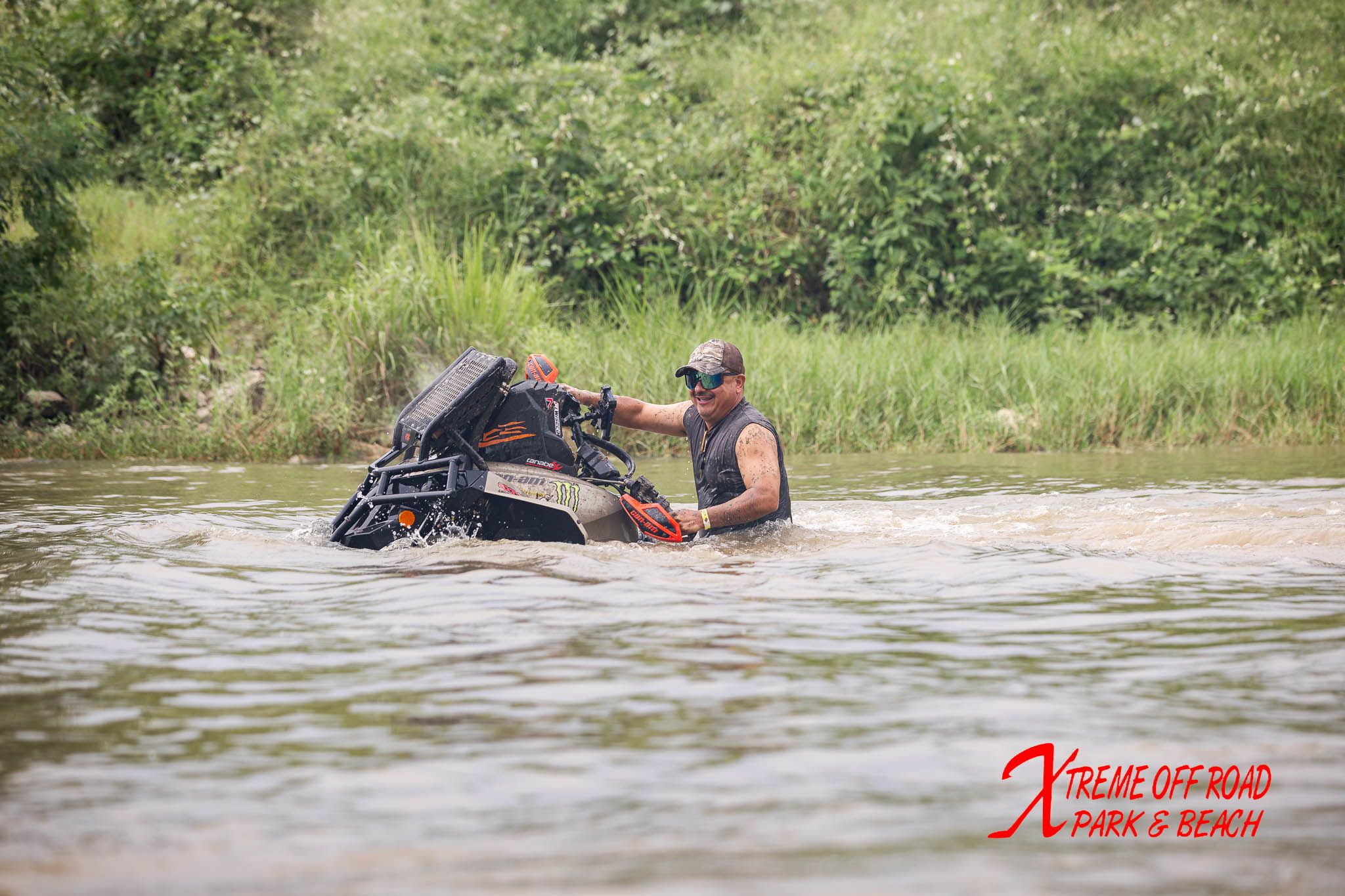 Off-road rider crossing the water at Xtreme Off Road Park
